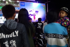 Listening to a concert in Dawei, Myanmar